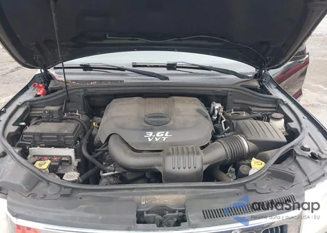 2013 Jeep Grand Cherokee Laredo из США, поврежденный, VIN 1C4RJFAG9DC647990